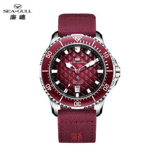 Seagull King of the Dragon automatic diver watch with a red scale-pattern dial and nylon strap.