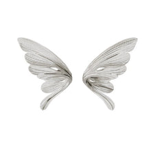 Silver wing-shaped earrings on a white background